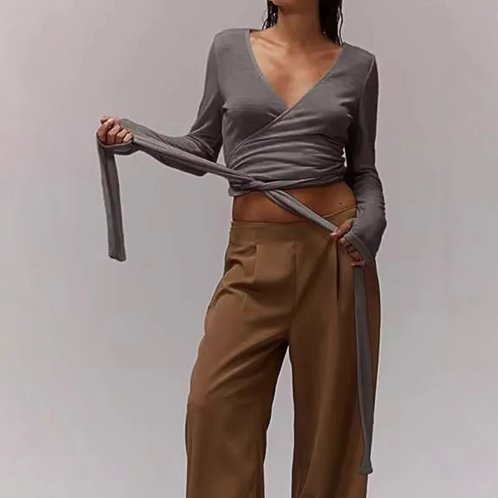 เสื้อยืดผู้หญิงทรงเข้ารูป คอวี ผูกเชือก แขนยาว สีพื้น ผ้าโพลีเอสเตอร์ รุ่นสปริง 2025 เหมาะสำหรับใส่ไปทำงาน