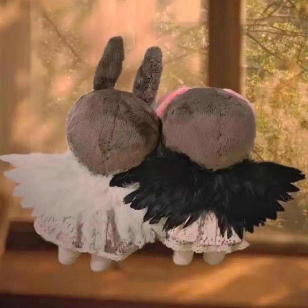 Bonita muñeca de algodón con alas de peluche suave Corea Kpop 20CM muñeca alas de plumas juguete ídolo de dibujos animados muñeco de peluche ala niñas