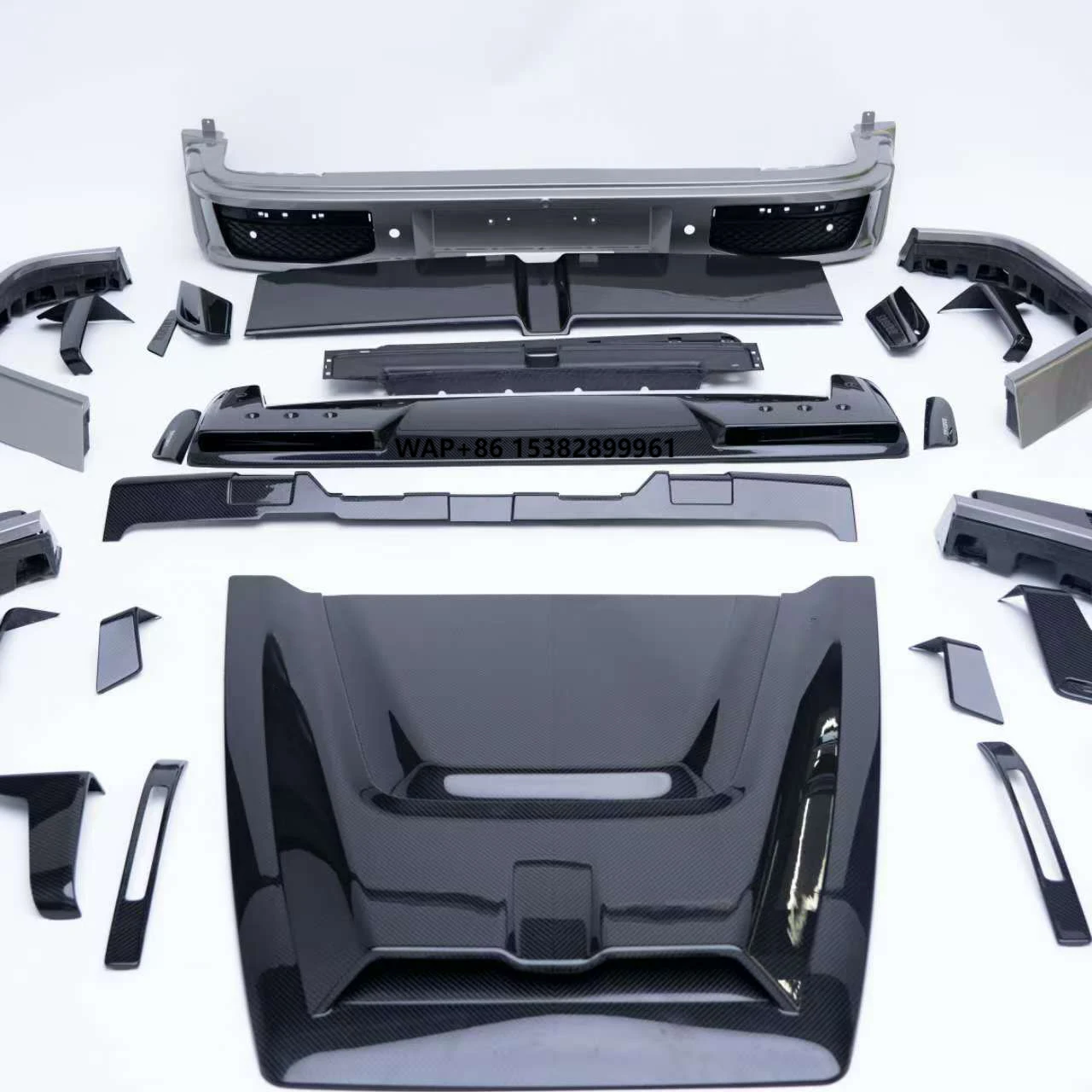 

Комплект обвеса G800 Style из сухого карбона для G W465: передний бампер, капот, накладки на колесные арки, задний спойлер