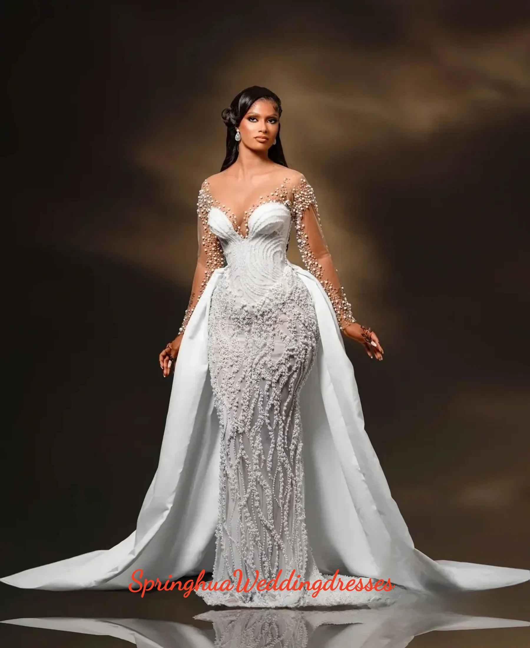 

Свадебное платье-русалка с индивидуальным дизайном, украшенное тяжелыми кристаллами и бисером, со съемной атласной юбкой, длинными рукавами и застежкой на пуговицы сзади