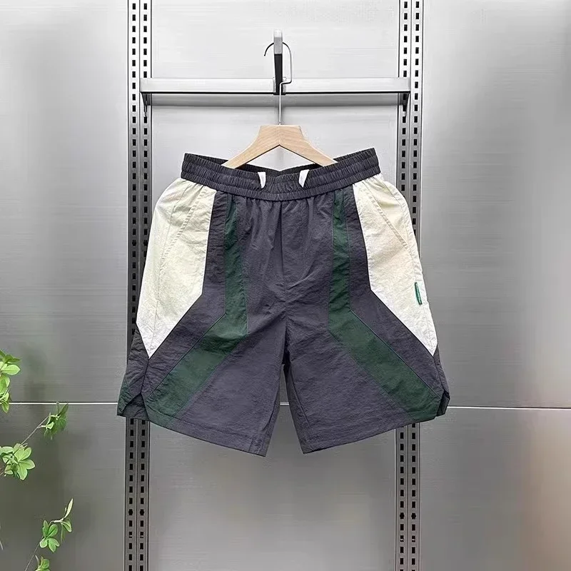 

Свободные мужские короткие брюки, пляжные широкие с карманами, быстросохнущие мешковатые летние стильные винтажные тонкие мужские шорты на шнурке