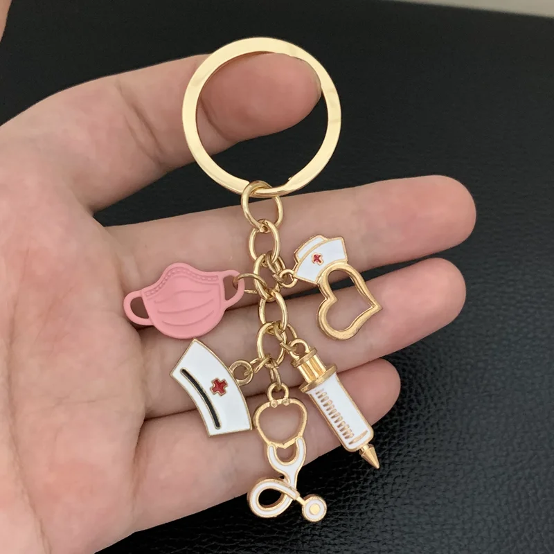 Nuevo diseño llavero médico herramienta médica estetoscopio jeringa mascarilla llavero enfermera regalo médico llavero recuerdo
