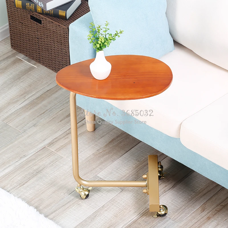 

Creative simple oval tea table mobile solid wood wrought iron sofa corner a few lazy bedside reading table