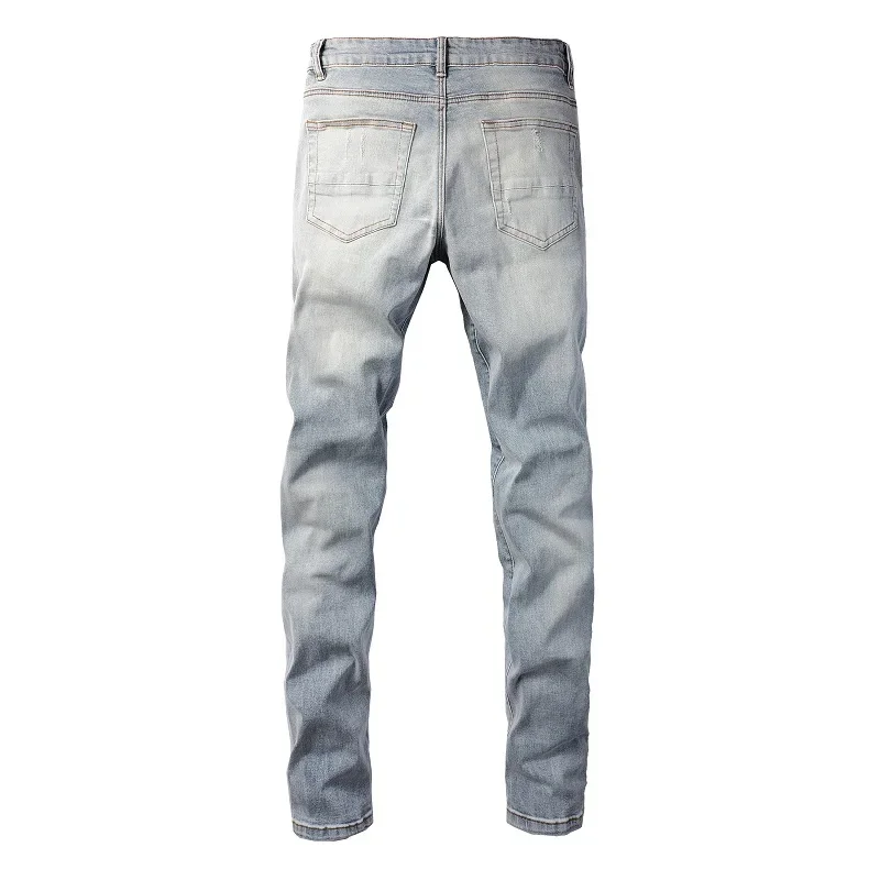 

Men Leather Patches Denim Jeans Streetwear Holes Ripped High Stretch Pants Light Blue Skinny Tapered Trousers