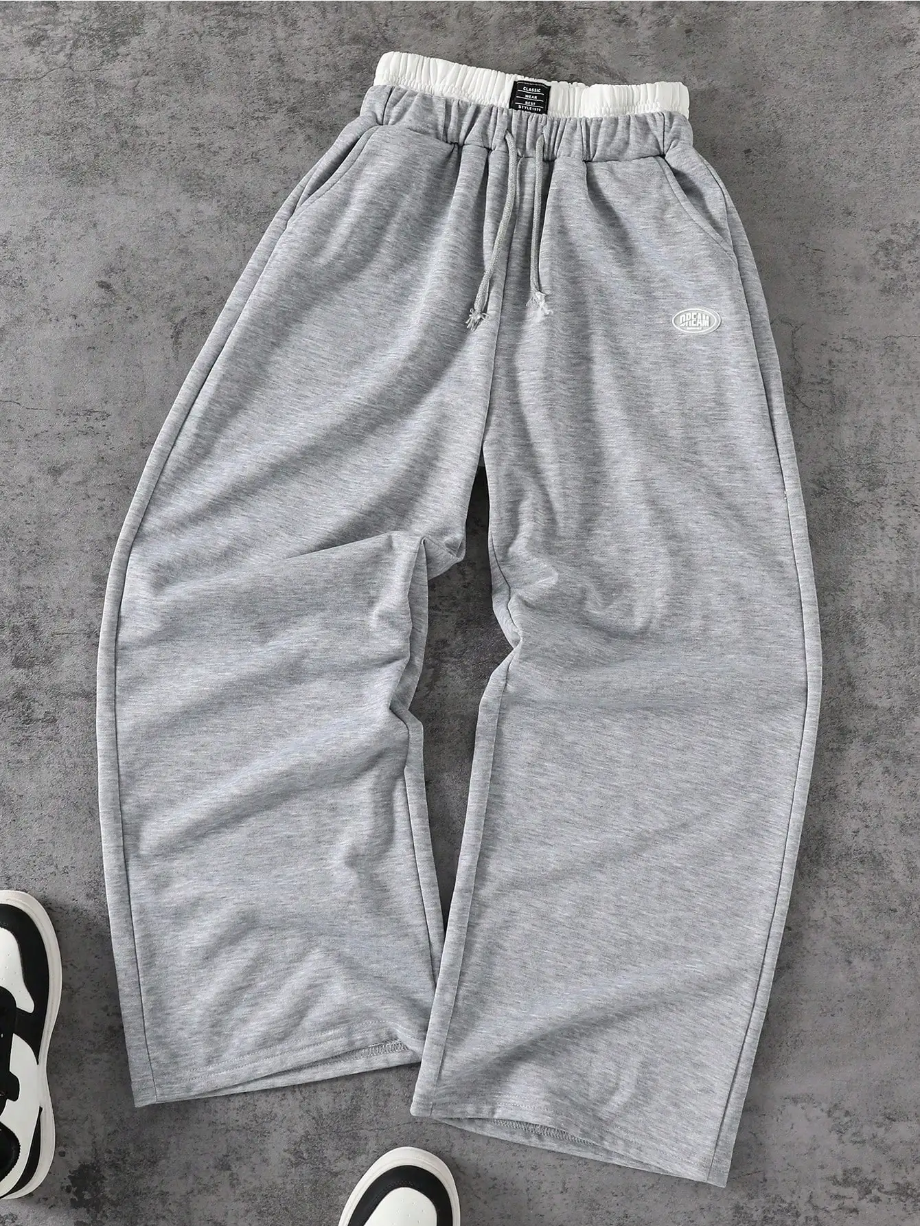 

Мужские и подростковые свободные трикотажные спортивные брюки с широкими штанинами и двойным поясом, серые