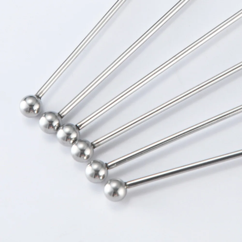 Stainless Steel Swizzle Stirrers Designed for Smooth Rotation in Glasses Pitchers and Shakers During Drink Preparation Steps