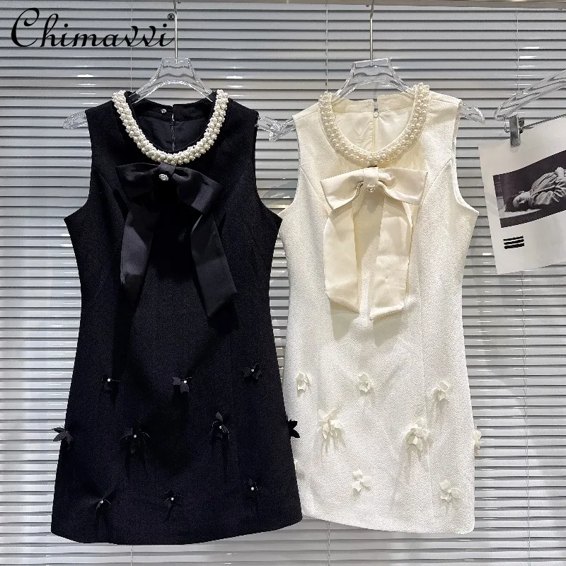 

2026 Spring New Fashion Heavy Pearl Collar Bow Design Vest Dress for Women Elegant Round Neck Sleeveless Slim Fit Short Dress