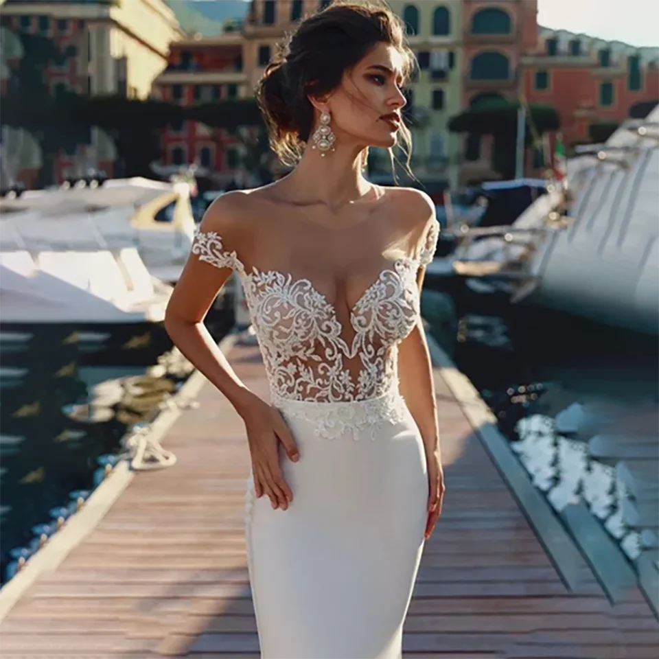 فستان زفاف حورية البحر مزين بالدانتيل على شكل قلب مخصص 2025 بدون أكمام بدون ظهر سويب تراين تول زي العرائس للنساء