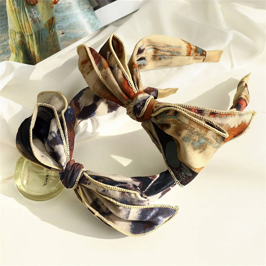 

Korean fashion retro temperament bow headband wide-brimmed hairpin women's fabric simple outer wear headband hair accessories