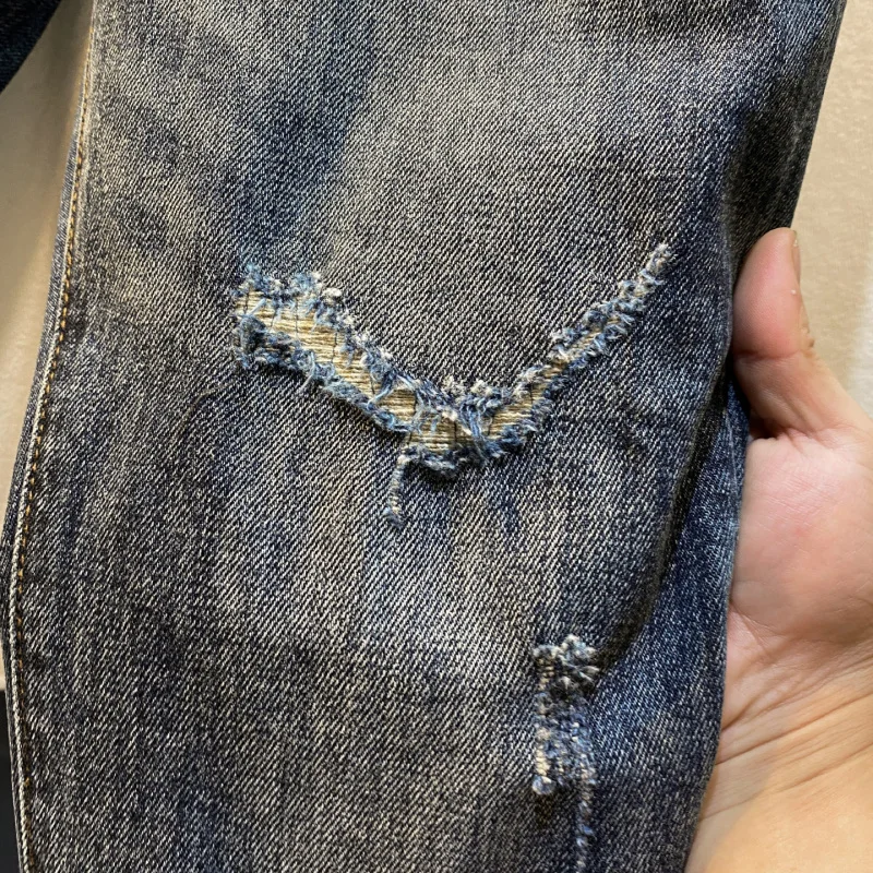 Tendência high-end 2025 outono novo rasgado remendado jeans magros masculinos na moda e bonito ruas casuais calças compridas