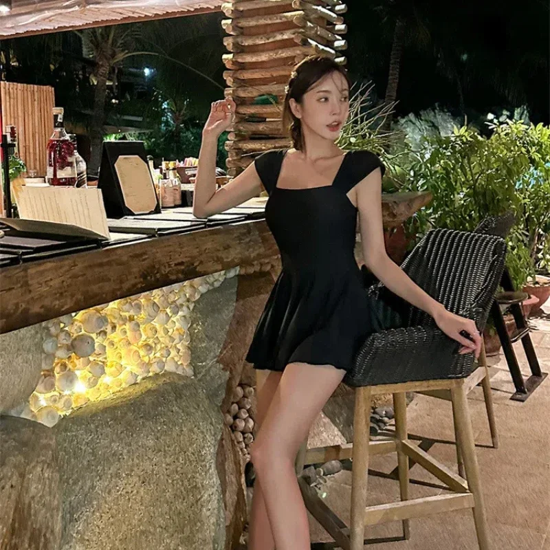 2025 traje de baño negro de una pieza, traje de baño para mujer, traje de baño Sexy de banda, vestido Monokini coreano, traje de baño para playa, pantalones cortos