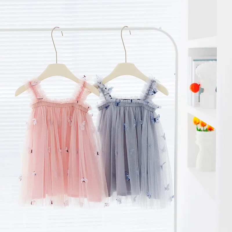 

New Baby Girl Clothes Solid Colour Sweet Butterfly Decorated Mesh Sling Baby Girl Dress Birthday Party Cute Princess Puffy Dress