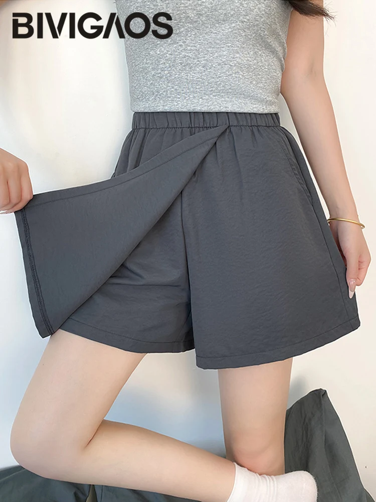 Bivigaos 2025 verão novo fino carga shorts saia feminina solta casual moda gelo seda falso duas peças esporte curto a linha saias