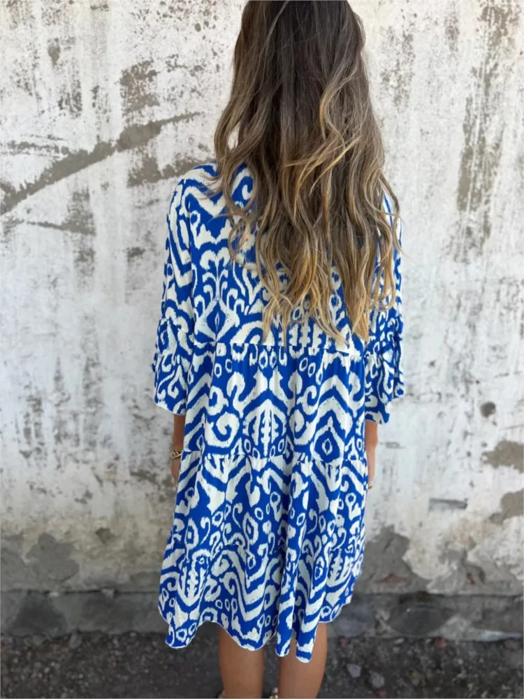 Boho Vacanza Camicia Abiti per le donne Sexy scollo a V Manica svasata Volant Stampa Abito Femme Primavera Casual Beach Abito ampio