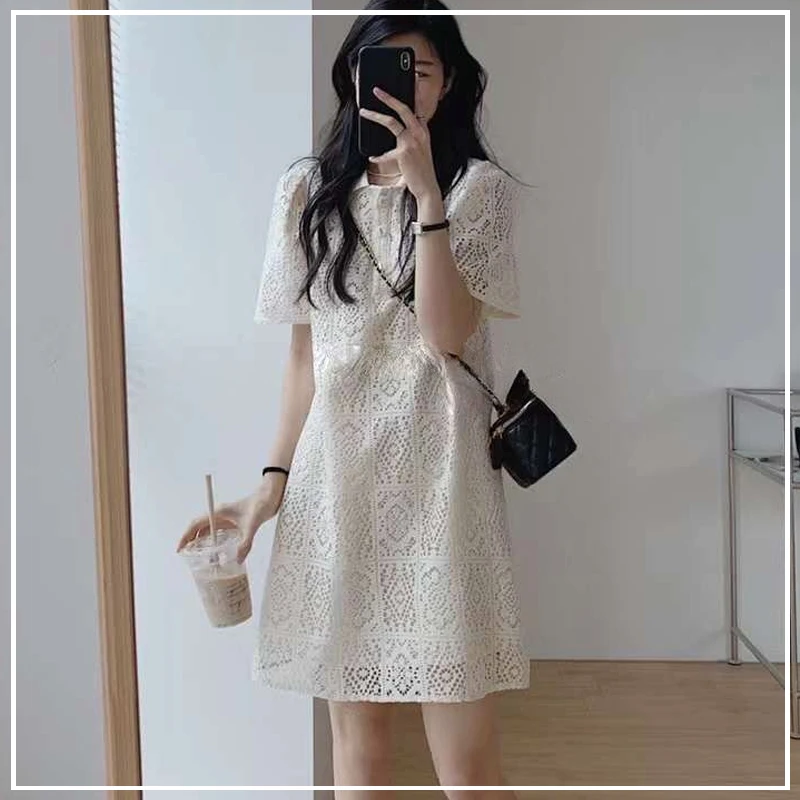 2024 New Summer Niche High-end Design Sense Hollowed Out Jacquard Fashion Casual Loose Commuting Minimalist Polo Neck Dress