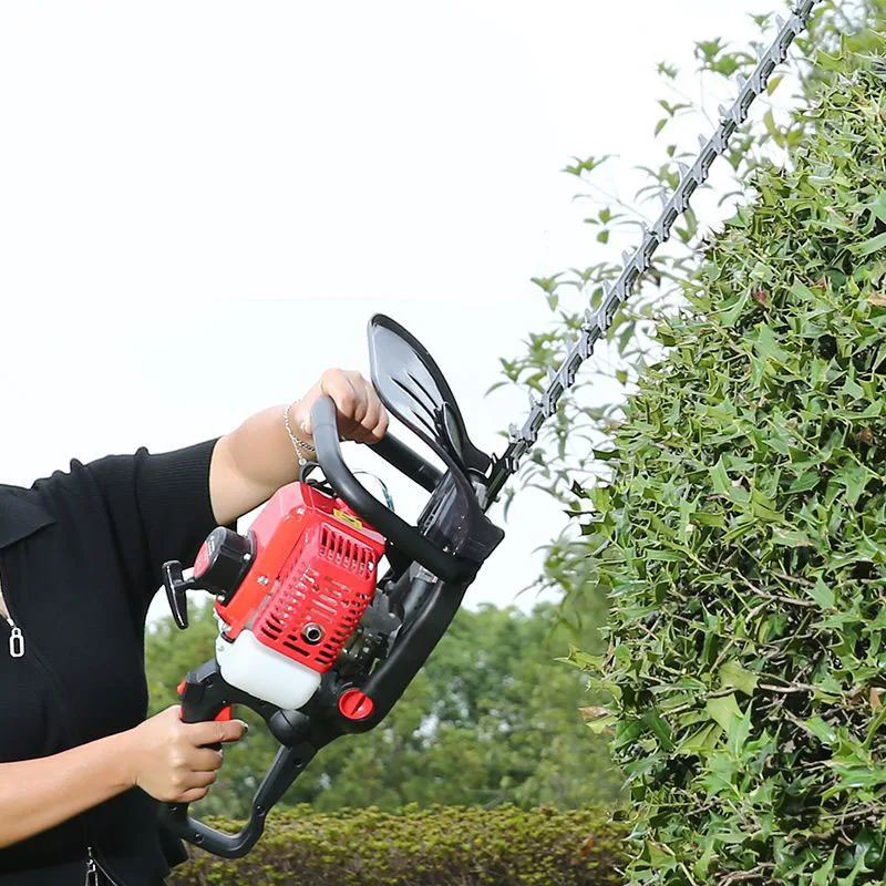 Professional hedge trimmer for trimming grass and shrubs