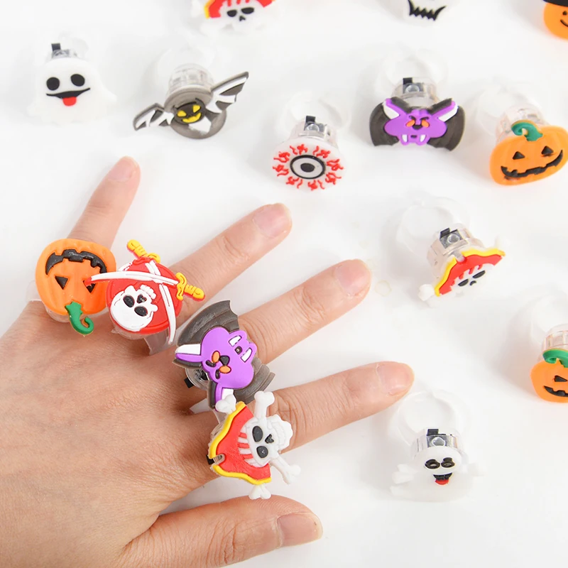 

10pcs Halloween Glow Ring Cartoon Pumpkin Ghost Skull Ring Glow In The Dark Halloween Party LED Flash Ornaments