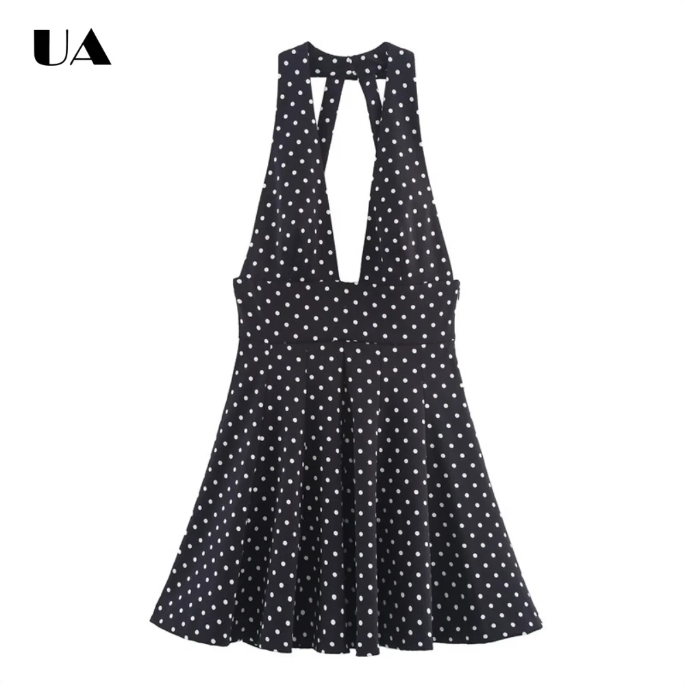 

Модное мини-платье в горошек с завязками на шее, приталенного силуэта, в деловом стиле, без рукавов, с открытой спиной