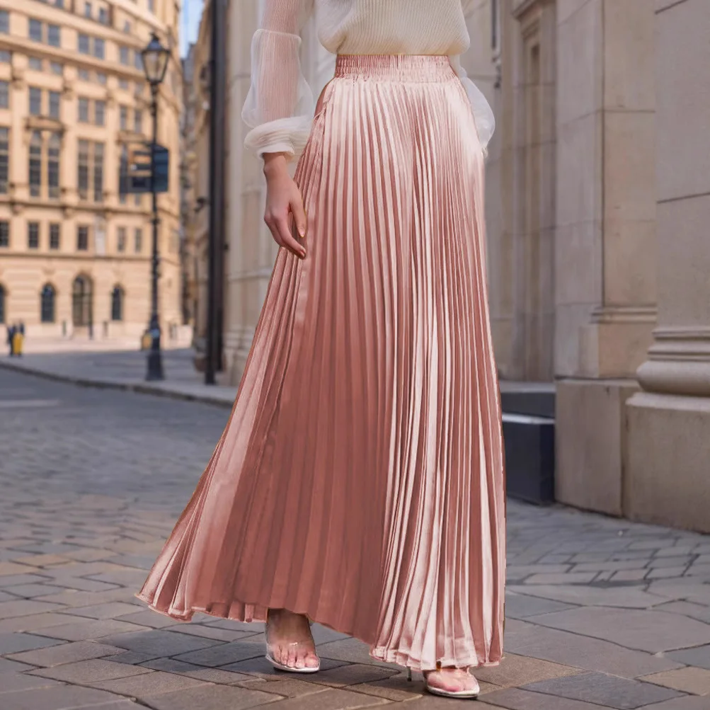 تنورة CHUJIE 2025 الجديدة ذات اللون الصلب ميدي المتدفقة بحاشية كبيرة وطويلة عالية الخصر بطيات الأكورديون