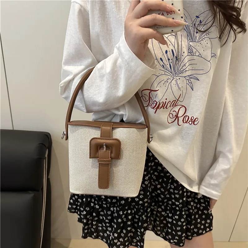 

Niche design canvas hand-held bucket bag 2025 summer new retro casual fashion shoulder cross-body bag