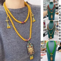 Nuova collana di nappe con perline rotonde lunghe in stile cinese con ciondolo Tangka tibetano, catena a tracolla, accessori per catena maglione