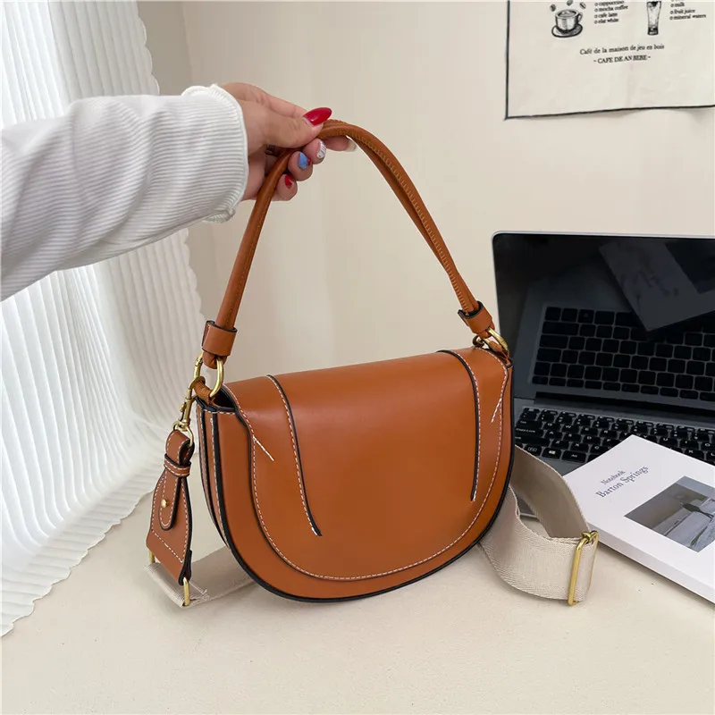 

Новинка: Испанская сумка-кроссбоди для женщин, вместительная сумка с магнитной застежкой, повседневная сумка через плечо или на подмышку.