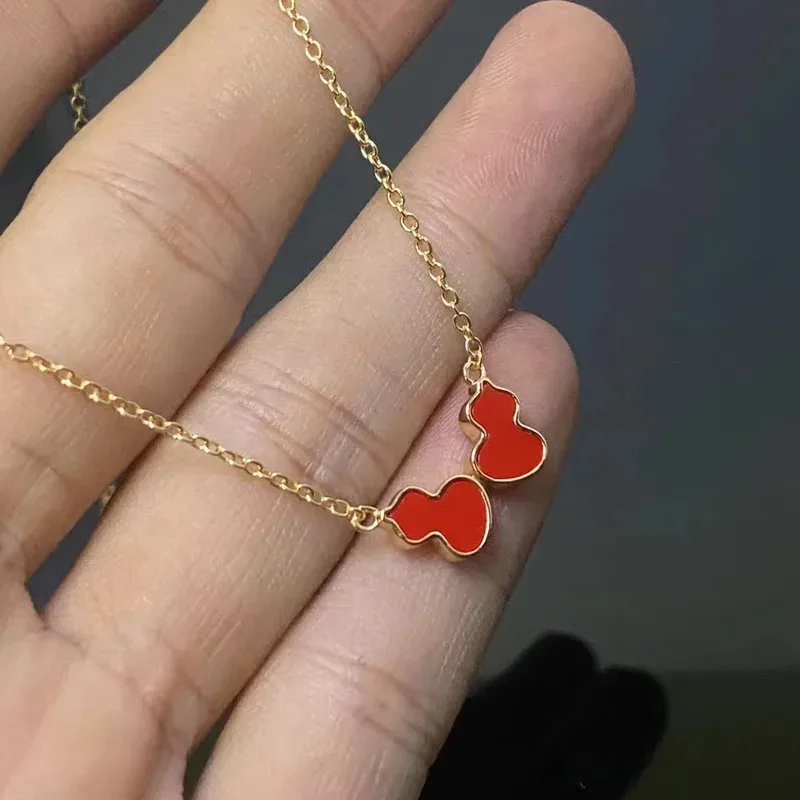 

Ожерелье Qilin High Edition с двойным красным кулоном-тыквой, инкрустированное бриллиантами 18К, с красным халцедоном, цепочка на ключицы SENLIN