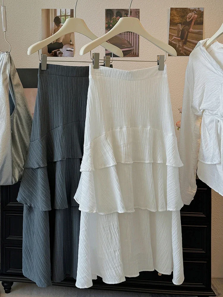 2023 frühling Sommer Neue Frauen Hohe Taille Dünne Lange Rock Mode Süße Unregelmäßige Rüschen Split Saum Kuchen Rock