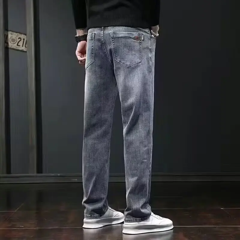 

Men's jeans 2026 Spring and Autumn new elastic loose straight leg winter with thick fleece men's casual pants