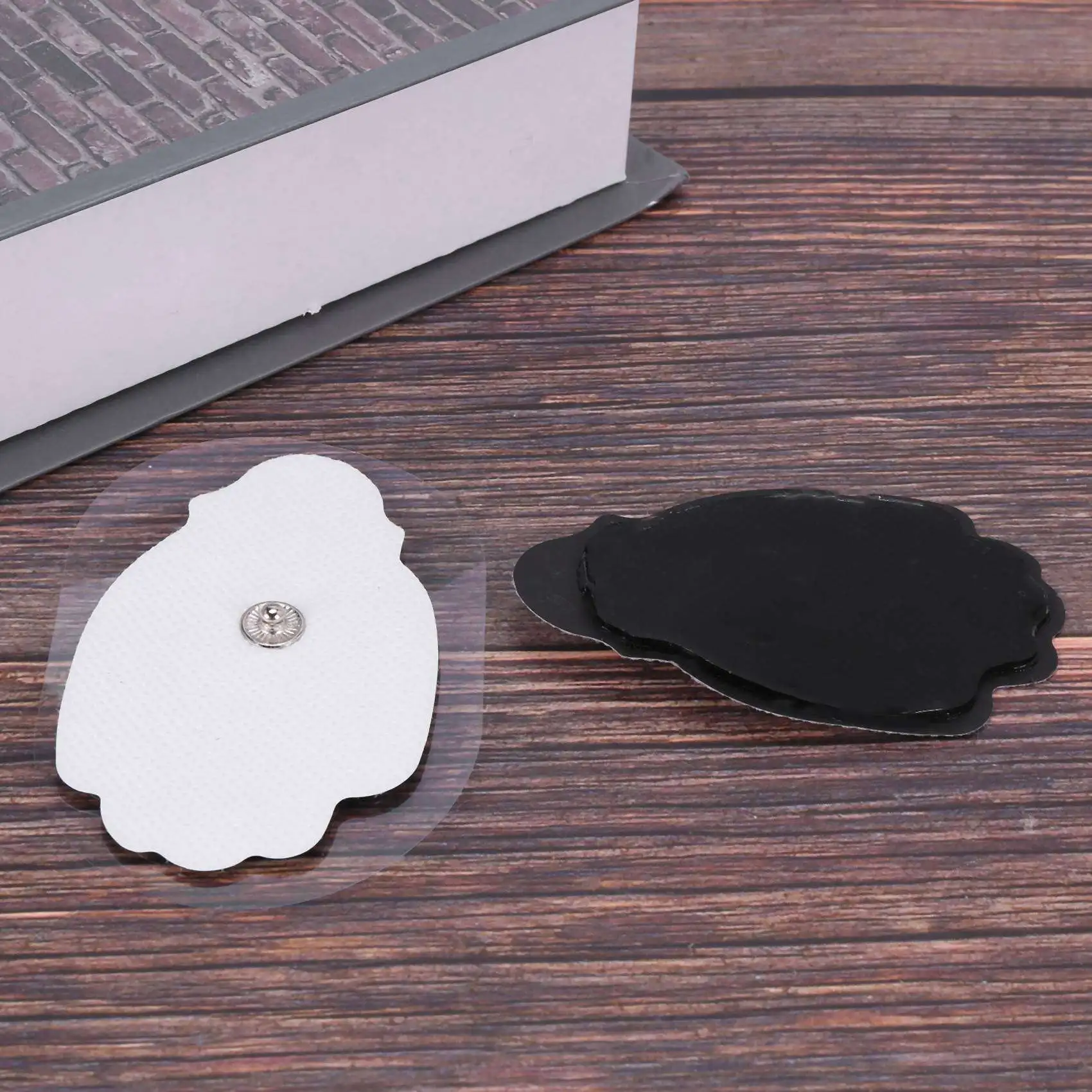 Y49A-40 قطعة منصات وحدة استبدال أقطاب كهربائية لوحدة عشرات قابلة لإعادة الاستخدام بقع القطب الكهربائي ذاتية اللصق