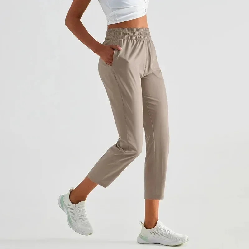 Lemon-Pantalones deportivos de secado rápido para mujer, pantalón de Yoga de longitud hasta la pantorrilla, de tiro alto, con bolsillos, ligero, informal, 23"