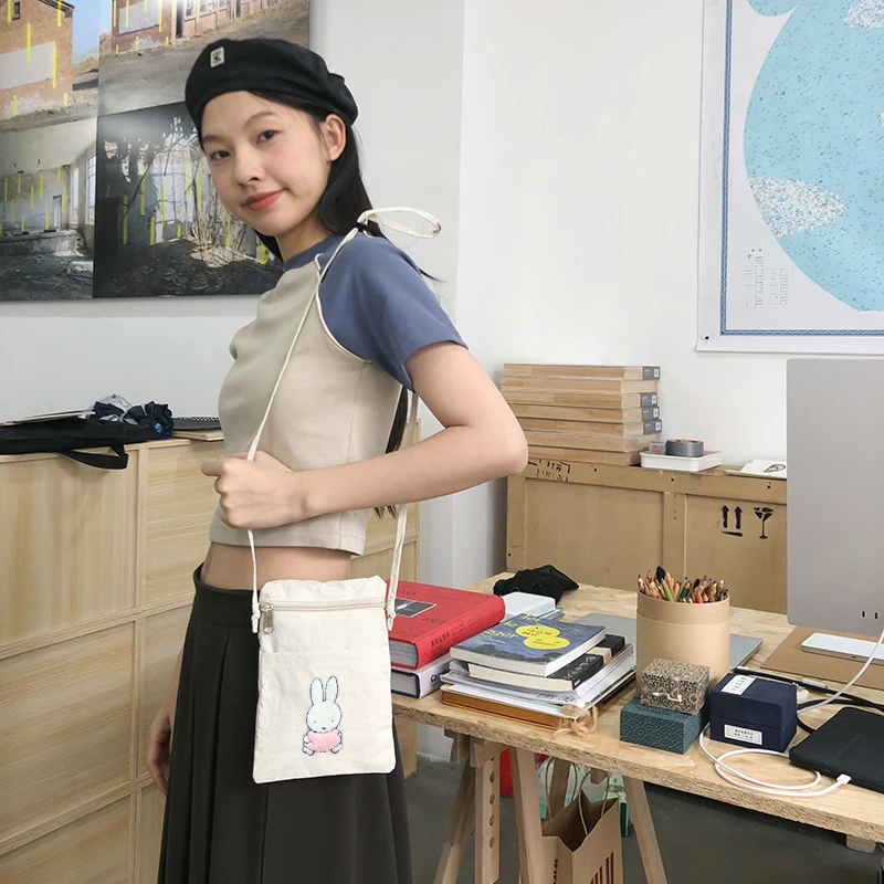 Bolso cruzado de nailon Kawaii Miffy, bolso minimalista para teléfono portátil con bonito conejito, bolsa para pasaporte de viaje, bolso de hombro informal Unisex