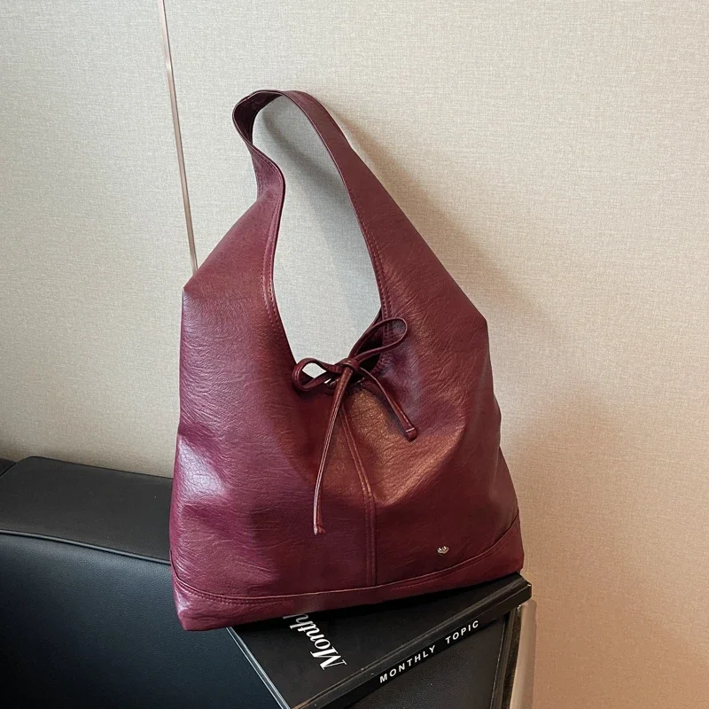 

Материал PU 2024, хит продаж, сумка через плечо с бантом, однотонная, красивая, модная, мягкая, простая, модная, в западном стиле, большая сумка