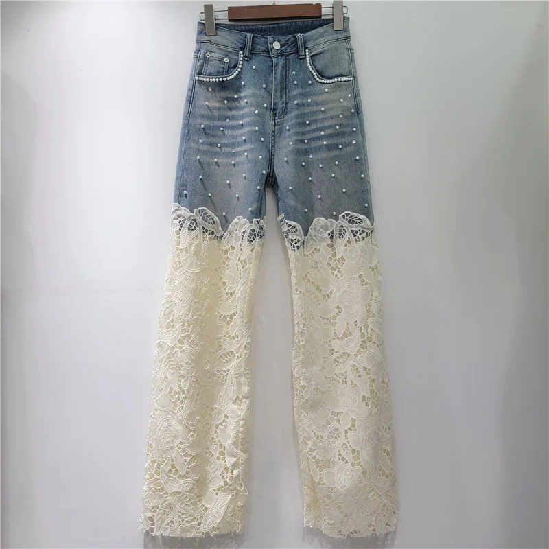 

Bedazzled & laced. These vintage wash jeans feature intricate openwork crochet and rhinestones for a daring, detailed look.