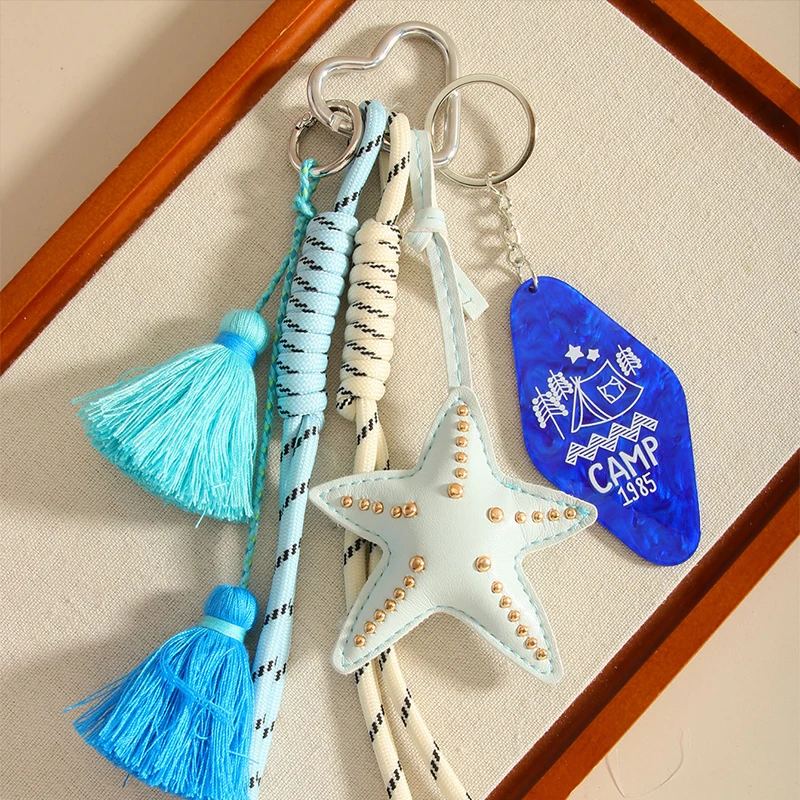 Miu نمط الخماسية نجمة الجلود القوس حقيبة سحر Y2K ليوبارد طباعة مطرز المفاتيح لطيف كيرينغ الإكسسوارات النساء محفظة الحلي