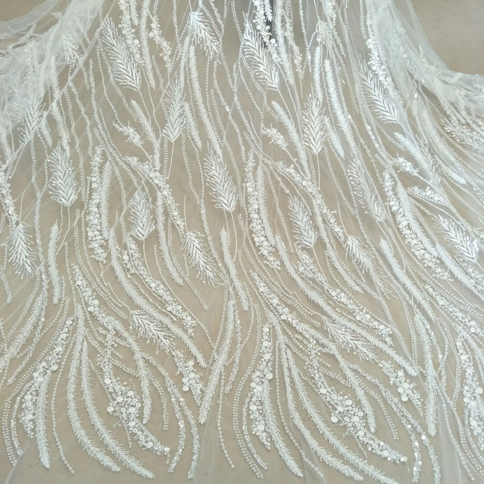 new arrival wedding gown dress lace fabric with beads and sequins lace pearls ivory lace sell by yard