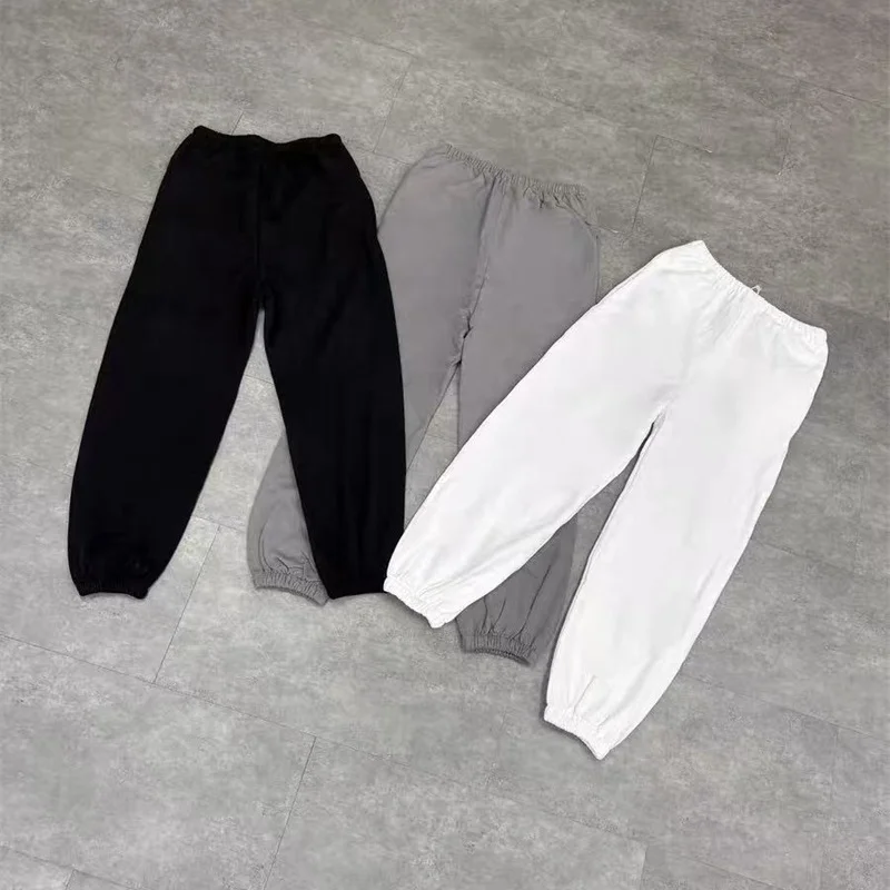 

Черные, белые, серые мужские и женские спортивные штаны Kanye West с манжетами, свободные однотонные повседневные брюки из 100% хлопка премиум-качества на шнурке