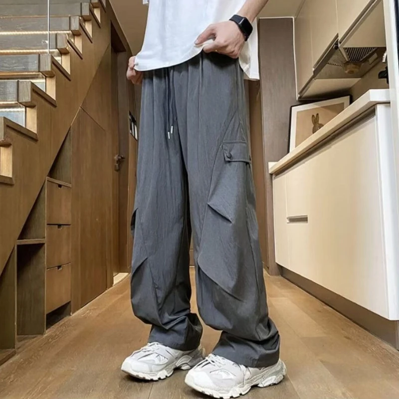 Męskie spodnie robocze szerokie cargo, dresowe, gładkie, tanie, nylonowe, w stylu koreańskim Y2k vintage streetwear, wysokiej jakości.