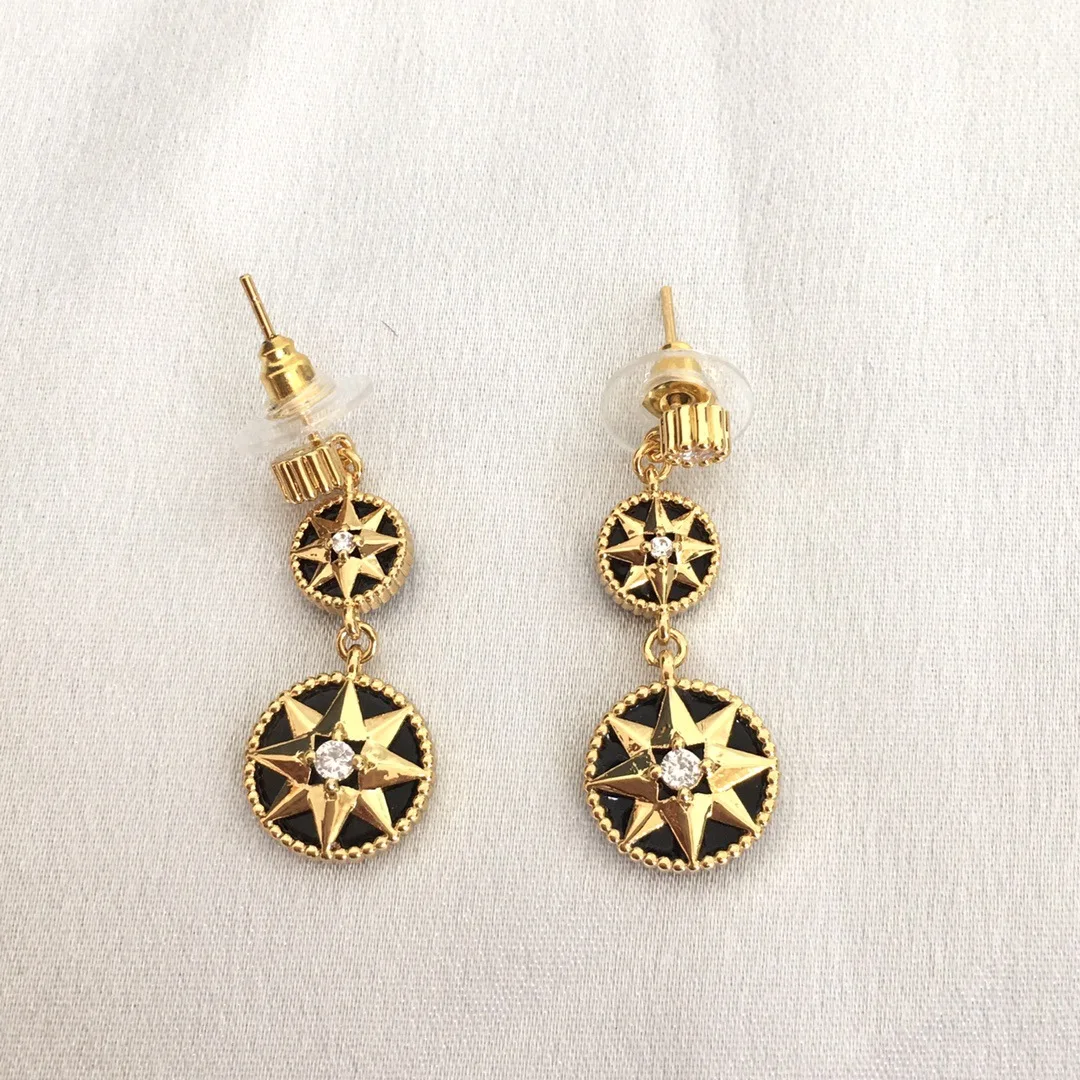 حار أزياء أوروبا القمر الأسود الذهب ستار أقراط المرأة سحر المجوهرات حزب المدرج العصرية