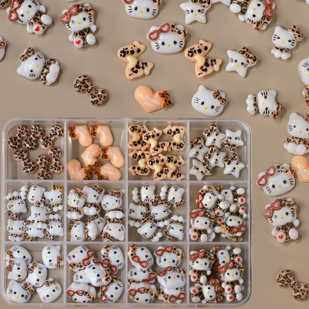 ชาร์มเล็บลายเสือดาว 3 มิติ 12 ช่อง ลายคิตตี้ น่ารัก ลายเสือดาวผสมโบว์ คุโรมิ มายเมโลดี้ ตกแต่งเล็บด้วยเพชร