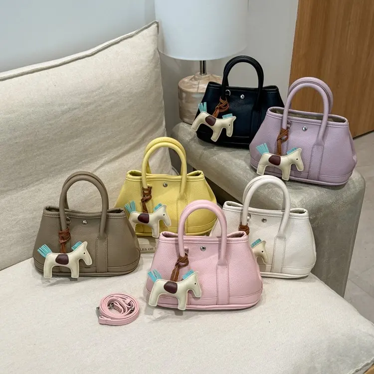 

Модные уникальные парижские дизайнерские сумки для подгузников для женщин, роскошные кожаные сумки большой вместимости, элегантные сумки через плечо, минималистичные.