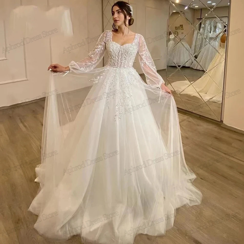 Romantische Brautkleider Prinzessin A-Linie Ballkleider Spitzen applikationen lange Puff ärmel Tüll gestufte Braut Vestidos de Novia 2024