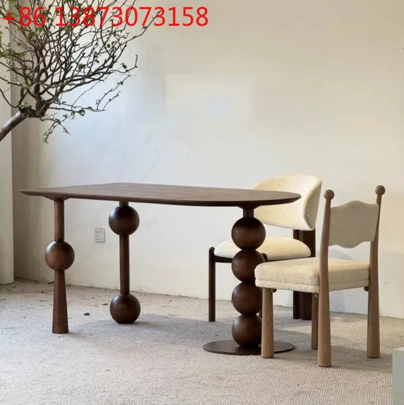 

Обеденный стол в скандинавском средневековом стиле, фигурный, геометрический, из массива дерева, в стиле ваби-саби, современный, простой, креативный, с индивидуальным дизайном.