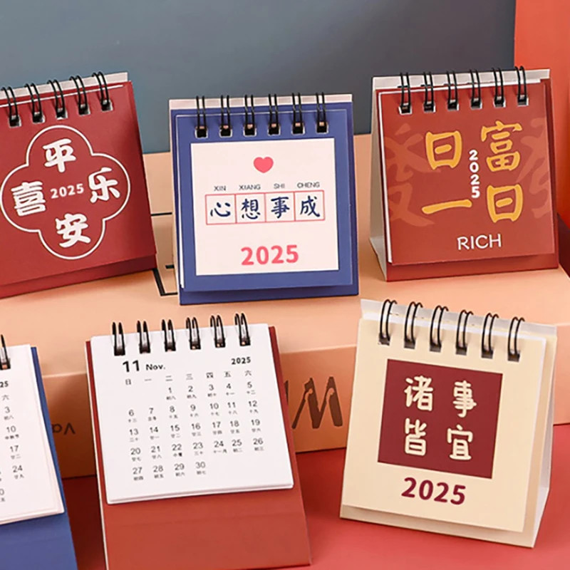 2025มินิแคตตันกระเป๋าปฏิทินตั้งโต๊ะขนาดเล็กแบบพกพาปฏิทินแบบเจาะแผนตกแต่ง
