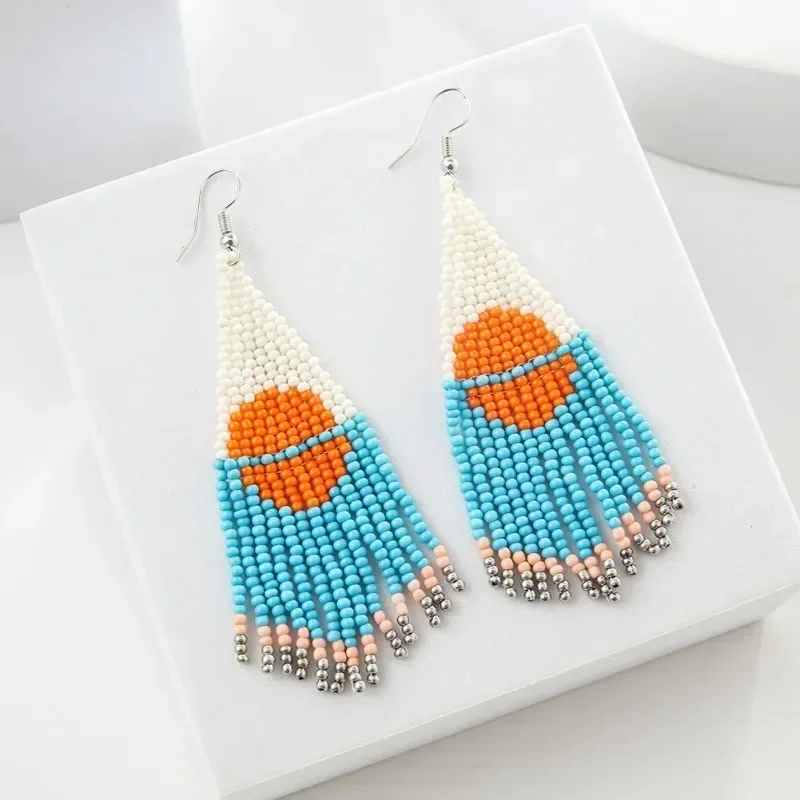 Beaded earrings Colorful sun Symmetry Hand knitting Tassel Bohemia Sunrise Female Alloy Design Tide  Rice bead earrings
