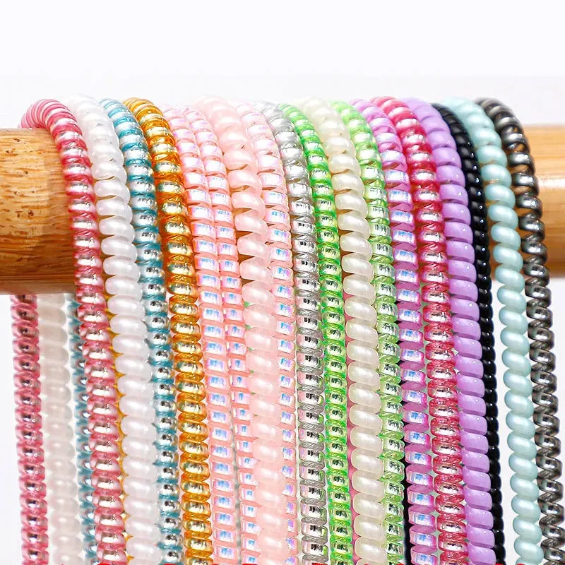 Penggulung Kabel Data iPhone/S - Spring Roll Wrapper ulasan dan harga
