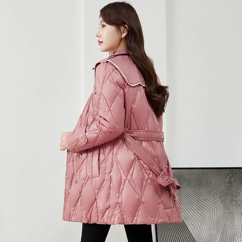 2025 Nuovo piumino invernale da donna stile coreano slim fit lungo piuma d'anatra bianca spessa giacca calda