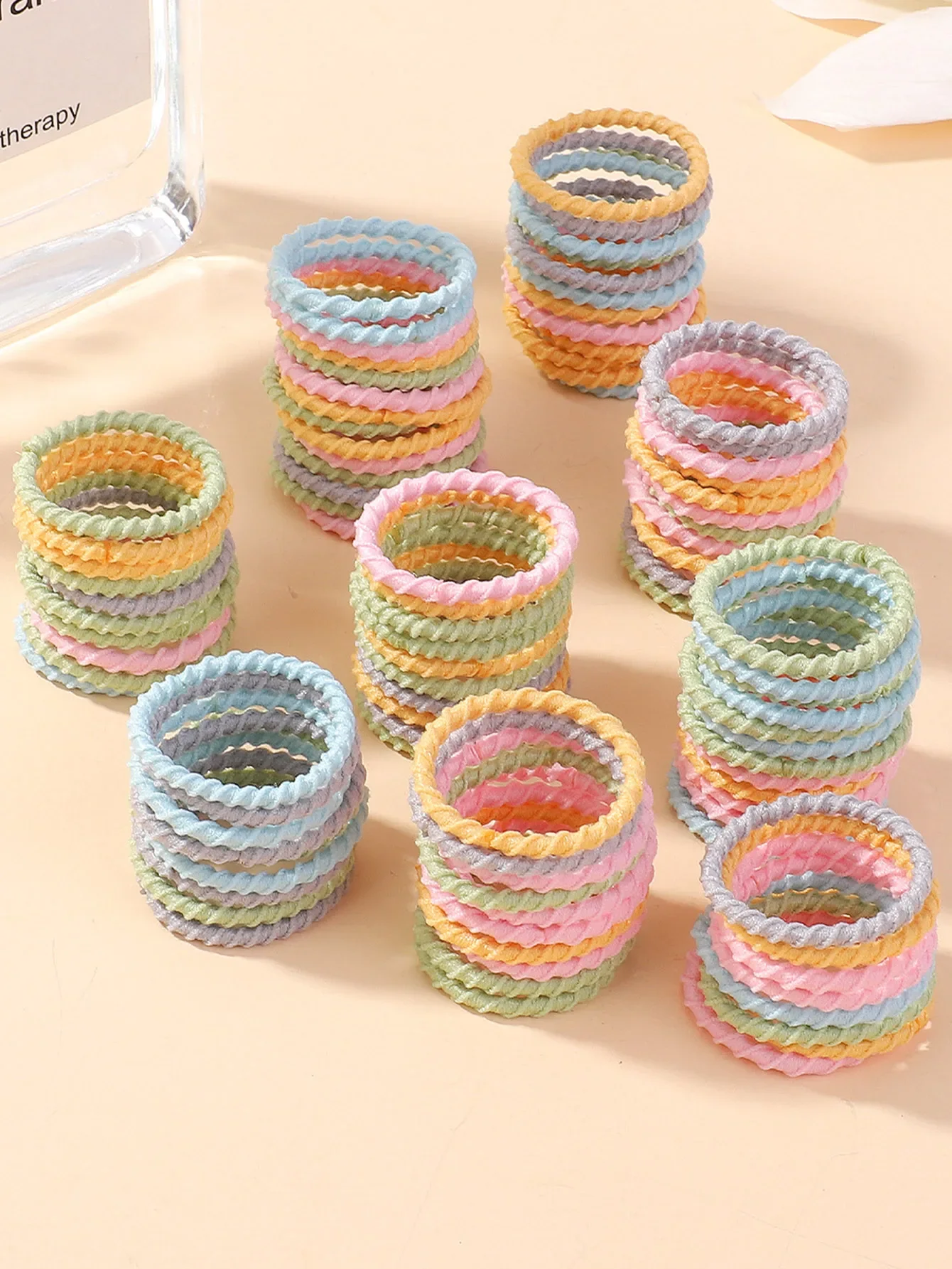 100 Uds. Banda de goma colorida de 2cm para bebé no daña el cabello anillo pequeño para el pulgar hilo elástico alto conjunto de coleteros para niños pequeños