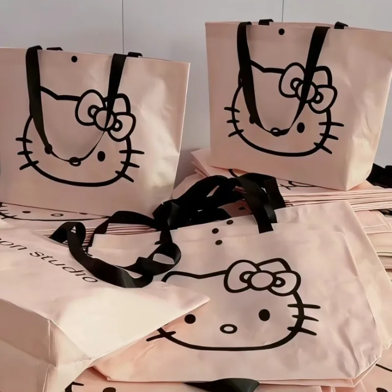 

10pcs Kawaii Hello Kitty Woven Bag Hand Held Backpack Toy Storage Outdoor Travel Picnic Environmentally Friendly Bag Accessories