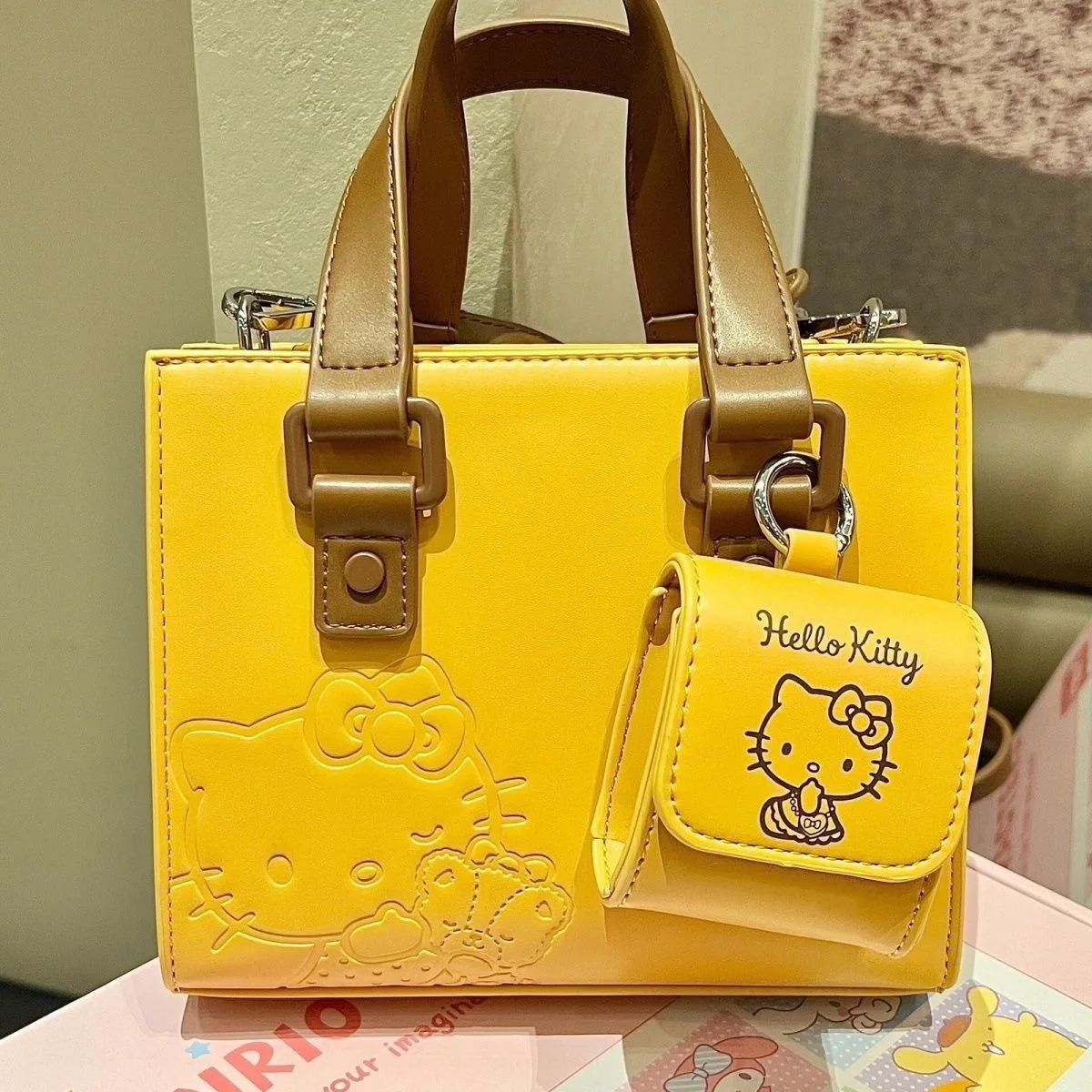 2024 New Hellos Kittys Design Bag Women's Shoulder Handbag New Yellow Kittys Crossbody Bag Premium Texture with Headphones Bags